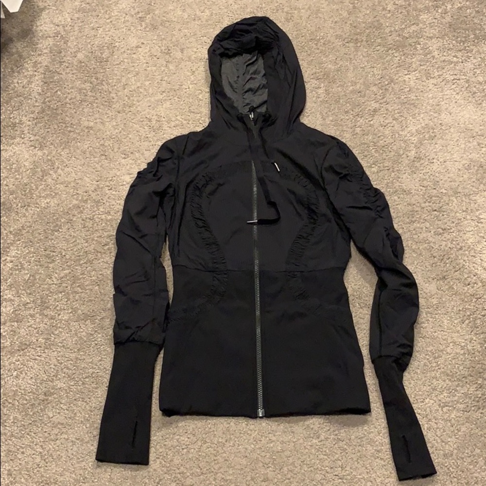 Stretchy Lululemon reversible jacket with hood.